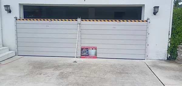 Storm shutter for garage